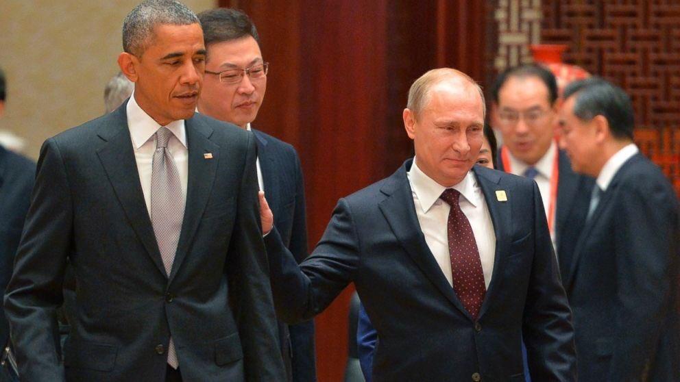 putin obama hand.jpg